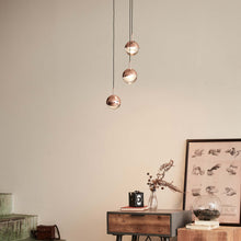 Load image into Gallery viewer, Dora LED Multi Light Pendant Light in living room.