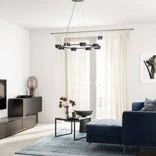Load image into Gallery viewer, OLO LED Ring Pendant Light in living room.