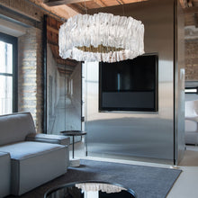 Load image into Gallery viewer, Accordeon LED Chandelier in living room.