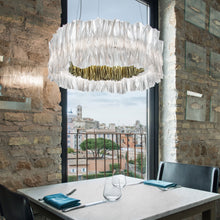 Load image into Gallery viewer, Accordeon LED Chandelier in dining room.
