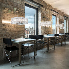 Load image into Gallery viewer, Accordeon LED Chandelier in dining room.