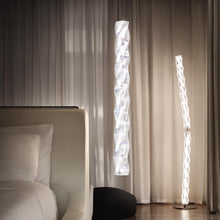 Load image into Gallery viewer, Hugo LED Floor Lamp in bedroom.