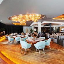 Load image into Gallery viewer, Veli LED Ceiling / Wall Light in restaurant.