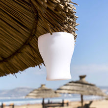 Load image into Gallery viewer, Olio Bluetooth Outdoor LED Table Lamp in Outside Area.