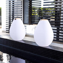 Load image into Gallery viewer, Vessel Bluetooth Outdoor LED Table Lamp in Outside Area.