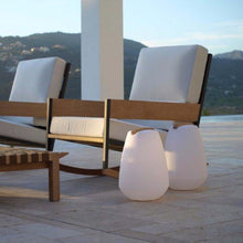 Load image into Gallery viewer, Vessel Bluetooth Outdoor LED Table Lamp in Outside Area.