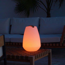 Load image into Gallery viewer, Vessel Bluetooth Outdoor LED Table Lamp in Outside Area.