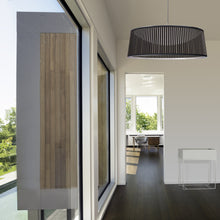 Load image into Gallery viewer, Solis LED Drum Pendant Light in living room.