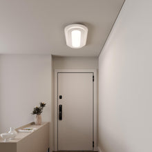 Load image into Gallery viewer, Offset™ Racetrack LED Flush Mount Ceiling Light in living room.