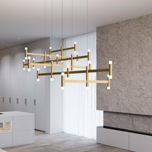 Load image into Gallery viewer, Systema Staccato™ LED Offset Pendant Light in living room.