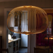 Load image into Gallery viewer, Spokes 3 LED Pendant Light in kitchen.