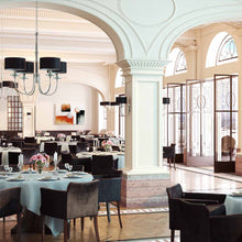 Load image into Gallery viewer, Manhattan Chandelier in restaurant.