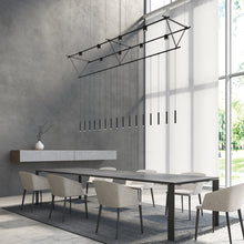 Load image into Gallery viewer, Suspenders® Triangle Truss Linear LED Suspension Light in office.