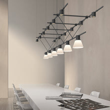 Load image into Gallery viewer, Suspenders® Triangle Truss Linear LED Suspension Light in office.