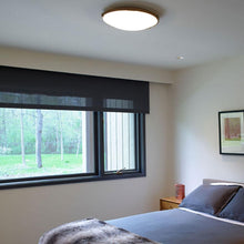 Load image into Gallery viewer, Lance LED Flush Mount Ceiling Light in bedroom.