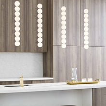 Load image into Gallery viewer, Orbet LED Pendant Light in kitchen.