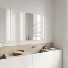 Load image into Gallery viewer, Thin-Line™ LED Wall Light in bathroom.