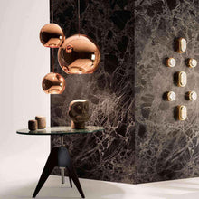 Load image into Gallery viewer, Copper Trio Round LED Pendant Light in exhibition.