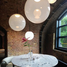 Load image into Gallery viewer, Opal LED Pendant Light in restaurant.