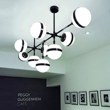 Load image into Gallery viewer, Peggy Pendant Light in coffee shop.