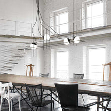 Load image into Gallery viewer, Plot Frame LED Pendant Light in dining room.