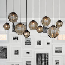 Load image into Gallery viewer, Puppet Linear Pendant Light in living room.