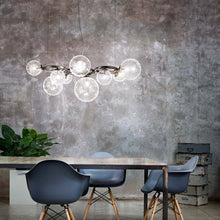 Load image into Gallery viewer, Puppet Ring Pendant Light in dining room.