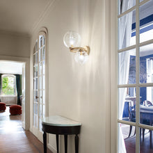 Load image into Gallery viewer, Puppet Ring Wall Light in living room.