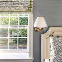 Load image into Gallery viewer, Primitive Swing Arm Wall Light in bedroom.