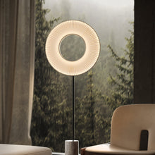 Load image into Gallery viewer, Iris LED Floor Lamp in living room.
