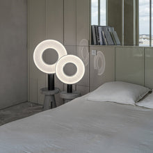 Load image into Gallery viewer, Iris LED Table Lamp in bedroom.
