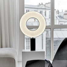 Load image into Gallery viewer, Iris LED Table Lamp in living room.
