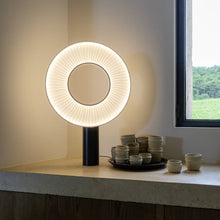 Load image into Gallery viewer, Iris LED Table Lamp in living room.
