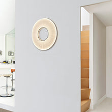 Load image into Gallery viewer, Iris LED Wall Light in living room.
