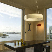 Load image into Gallery viewer, Ronde LED Pendant Light in living room.

