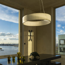 Load image into Gallery viewer, Ronde LED Pendant Light in living room.
