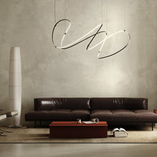 Load image into Gallery viewer, Zigouzi LED Pendant Light in living room.
