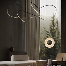 Load image into Gallery viewer, Zigouzi LED Pendant Light in living room.
