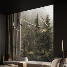 Load image into Gallery viewer, Zigouzi LED Pendant Light in living room.
