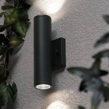 Load image into Gallery viewer, Beverly Outdoor LED Wall Light in Outside Area.
