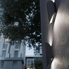 Load image into Gallery viewer, Remy Outdoor LED Wall Light in Outside Area.
