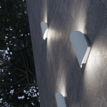 Load image into Gallery viewer, Remy Outdoor LED Wall Light in Outside Area.
