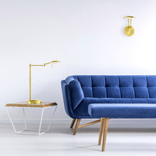 Load image into Gallery viewer, Dessau Arch LED Wall Light in living room.

