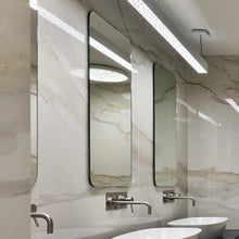 Load image into Gallery viewer, Calipso LED Linear Suspension Light in bathroom.
