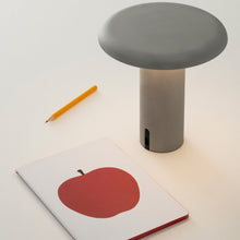 Load image into Gallery viewer, Takku LED Table Lamp in living room.
