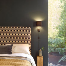 Load image into Gallery viewer, Arbor Plug-In Wall Light in bedroom.

