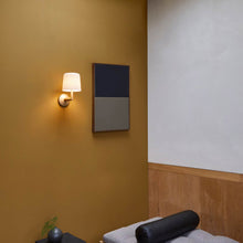 Load image into Gallery viewer, Ella Wall Light in living room.
