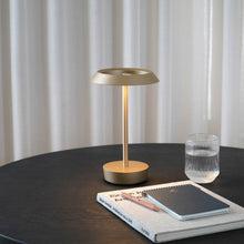 Load image into Gallery viewer, Halo LED Portable Table Lamp in living room.

