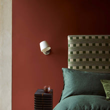 Load image into Gallery viewer, Imari Adjustable Wall Light in bedroom.
