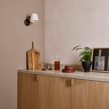 Load image into Gallery viewer, Imari Adjustable Wall Light in living room.
